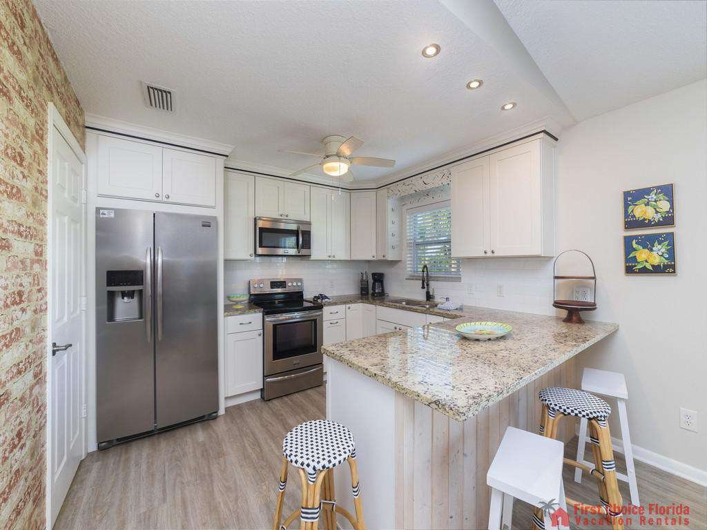 Island Retreat Unit A Kitchen with Bar Seating